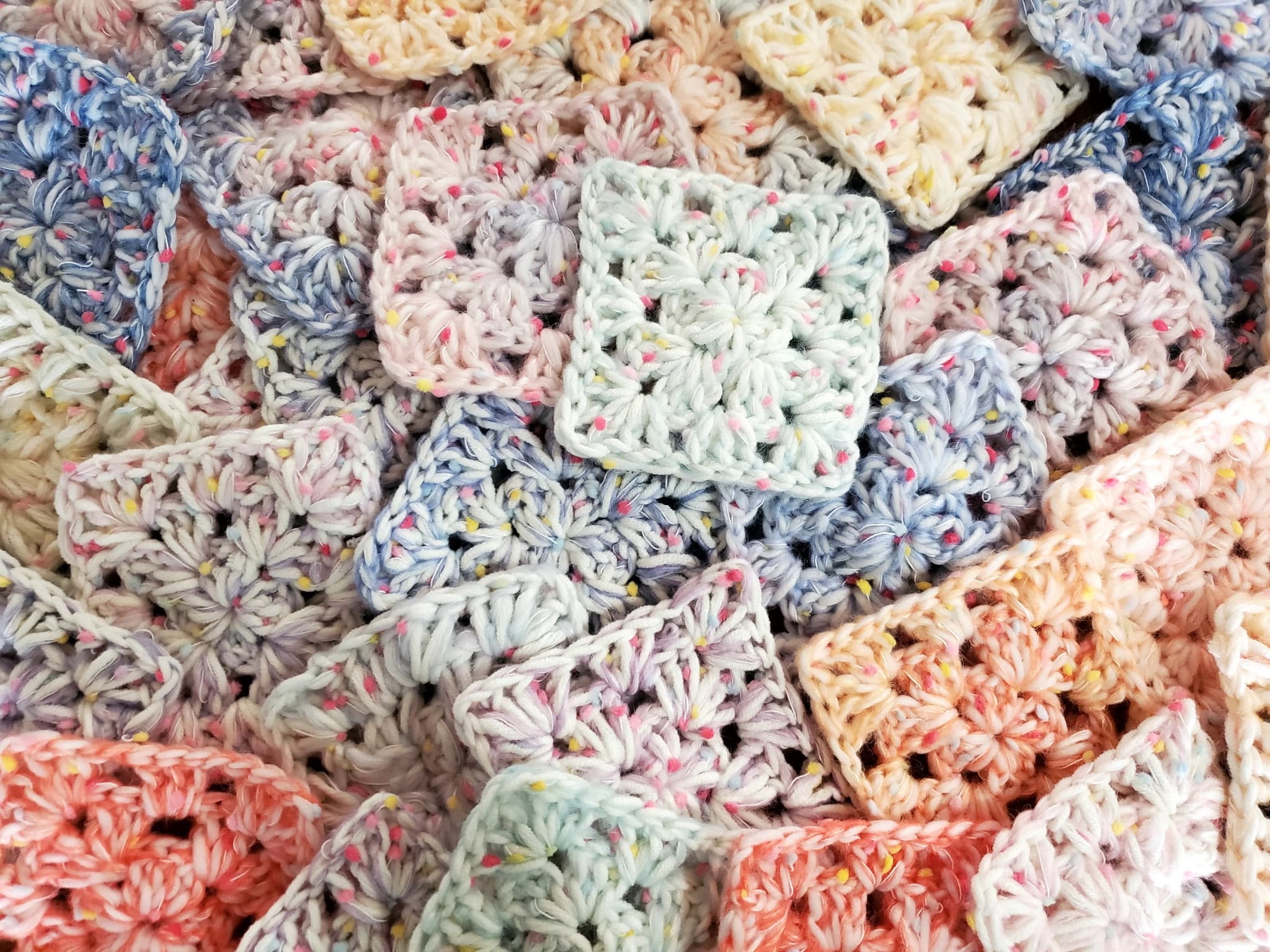 Crocheted granny squares background
